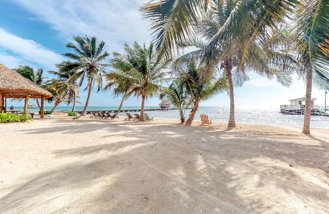 Garden-view condo steps to the beach with pool, dock & AC - snowbird-friendly