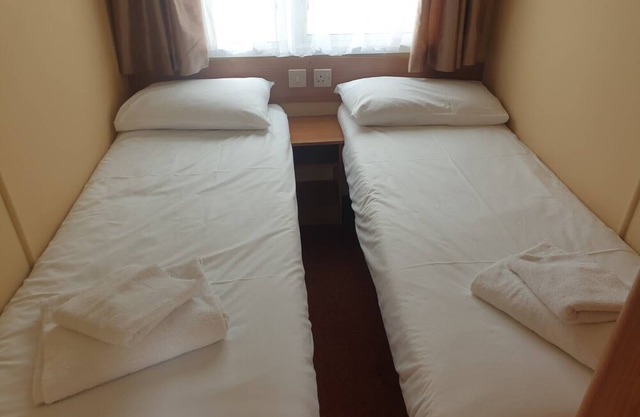 Winchelsea sands holiday park , Sandy shore