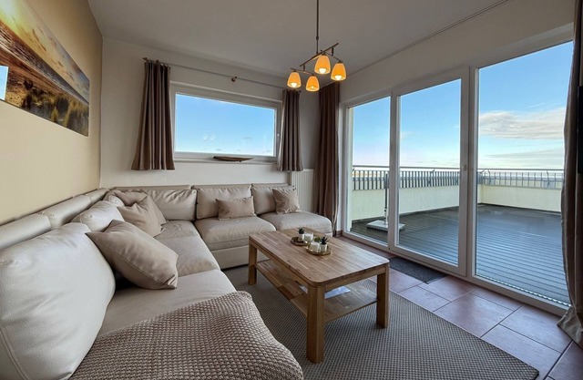 Great penthouse with 54 sqm roof terrace, sea view, sauna and hot tub! -