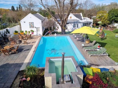 Greyton Toad Hall exclusive use up to 18 and by supplement up to 22 with massive pool and hot tub and sometimes we rent individual rooms