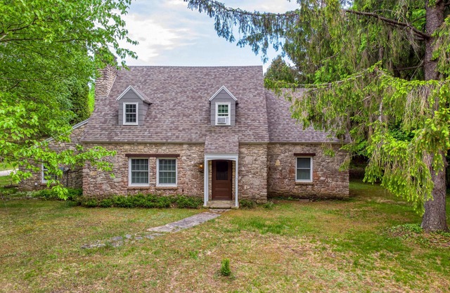 Hallmark Movies watch out! Charming Stone Cottage in Fish Creek