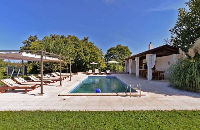 Holiday home in a quiet location with an outdoor pool