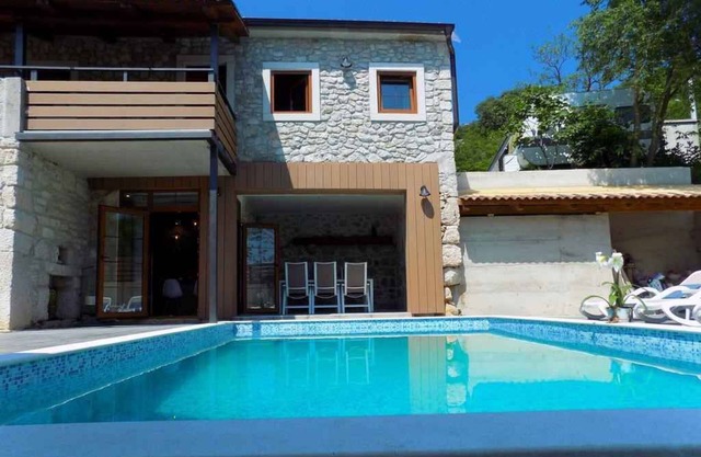 Holiday home with heated pool