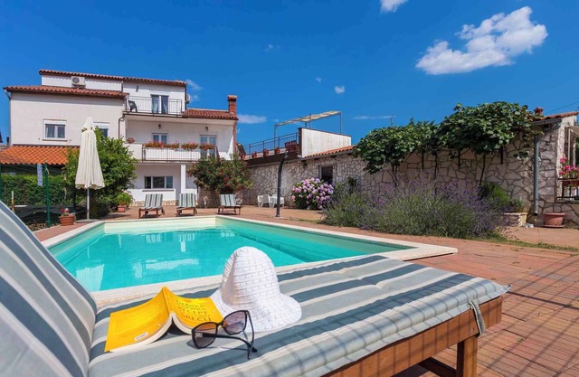 Holiday home with outdoor pool