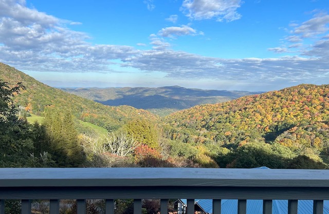 Home overlooking the mountains with a spacious deck, firepit, grill, W/D, & AC