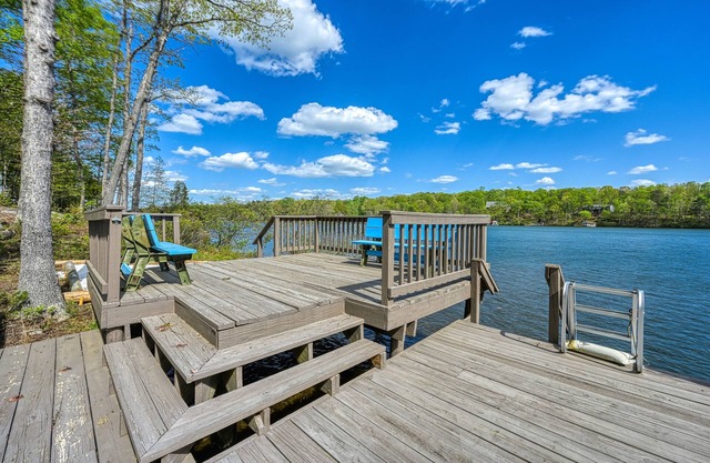 Inviting lakefront home with game room, kayaks, firepit, central AC, & W/D