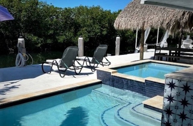 Islamorada Boaters Paradise with 70' Dock and private beach access.