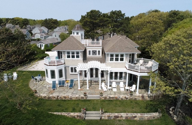 Its location location! New Seabury oceanfront property on private deeded beach!
