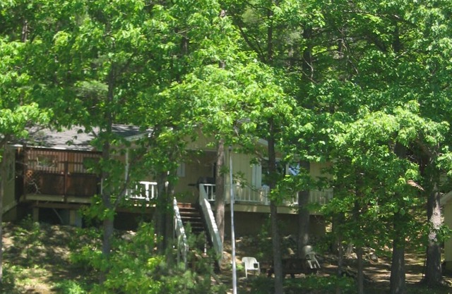 Lakefront Vacation House with Fireplace and Hot Tub.