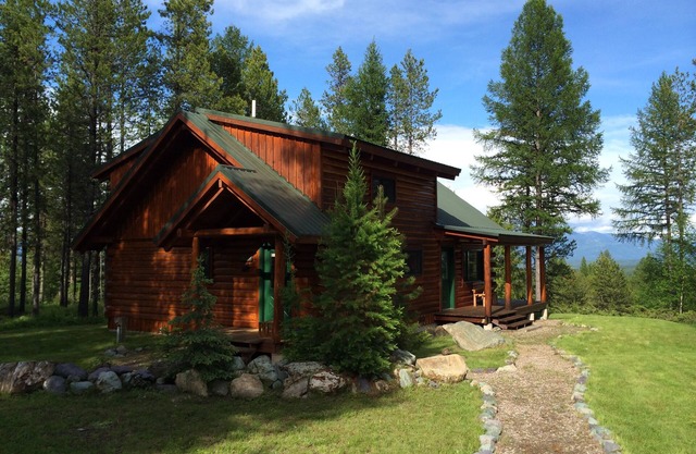 Log Cabin in the Woods Where the Wild Animals Roam