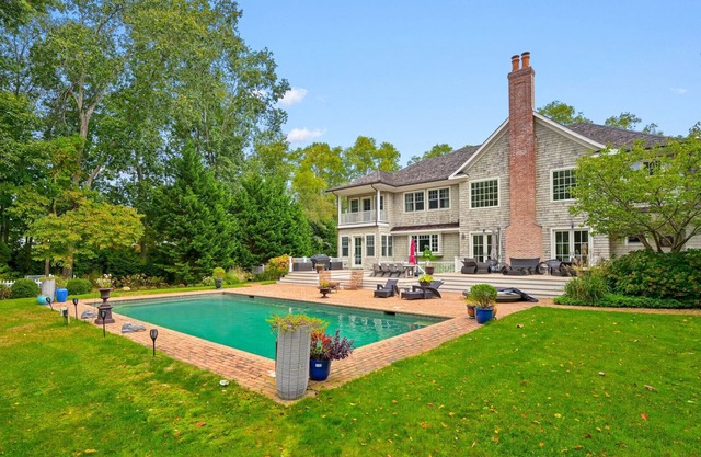 Majestic estate in coveted Private North Haven Community, 2 acres of lush.