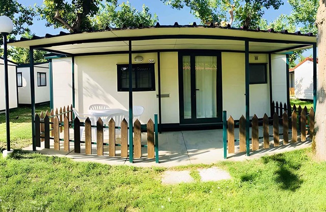 Mobilehome on campsite in the pine forest