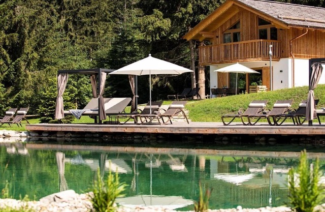 Nice chalet in Wölting with natural swimming pond