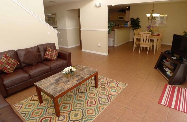 Open, spacious Lake Wilson Preserve 4/3 pool home with every comfort and convenience. Ten minutes to