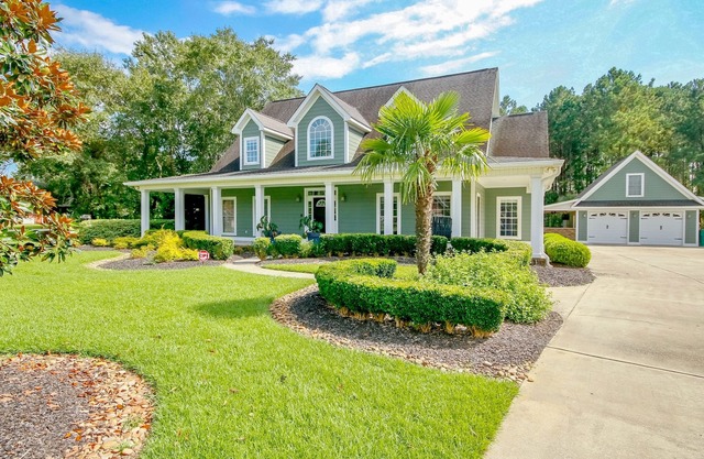 Palm & Gem | Luxury home in Myrtle Beach with resort-style pool, outdoor kitchen