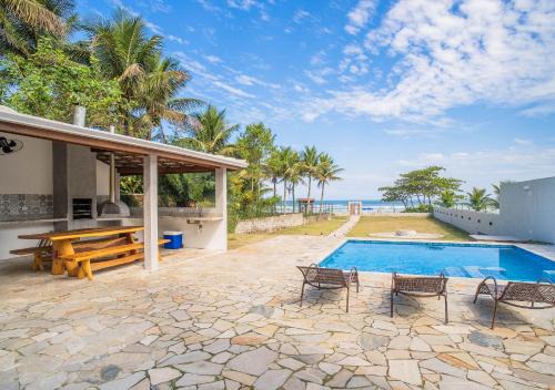 Paraíso Pé na Areia em Boracéia - Desfrute da conveniência de ter a praia no seu quintal