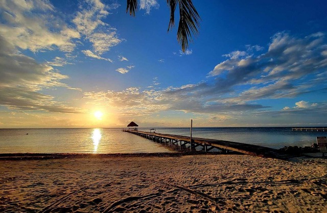 Paradise awaits in Belize Ground floor Beach Home with easy beach and pool access!