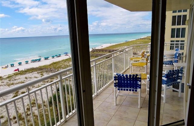 Pearl 406 What a view! Sugar White Sand & Emerald Waters! Wrap Around Balcony!
