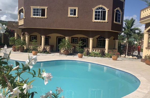 Pool View Two Bedroom Apartment with En-Suite, Open Kitchen and Living Room