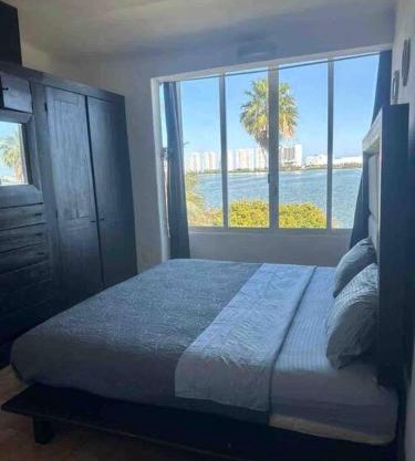 Prime Lagoonfront Apt in Hotel Zone - Walk to Beaches & Nightlife
