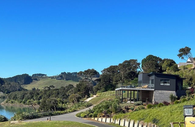 Rangitahi paradise. A modern 4 bedroom home overlooking the estuary in Raglan.