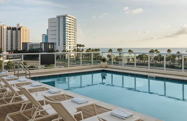 Relax in 4 Elegant Rooms with Rooftop Pool and Poolside Umbrellas