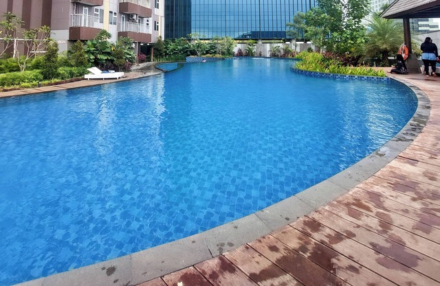 Restful and Comfy Studio Podomoro City Deli Medan Apartment