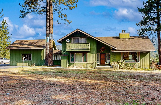 Rustic riverfront house with wood stove & valley views from private deck