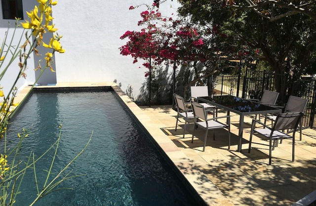 Self contained 4 bedroom luxury accommodation with pool set in Villa Honeysuckl