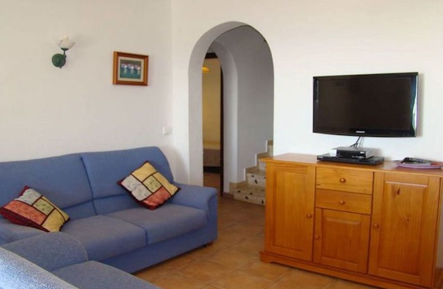 Semi-detached villa with private pool and sea views, located in San Jaime, a few meters from the sho