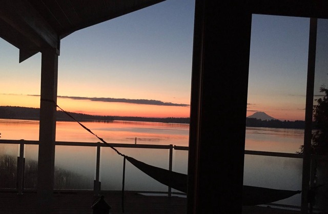 Serene Puget Sound waterfront home with beach access and Mt Rainer view.