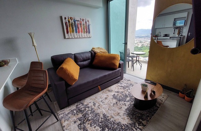 Skyline Retreat Top Floor 1BR Apartment with Mountain Views