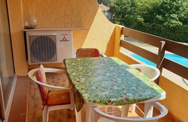 Spacious 2-BR Apartment, Pool View, 300m from Beach, A/C, Parking, Balcony, Elevator Access