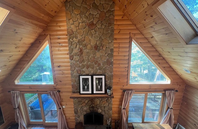 Spacious Lakefront Log Home for Family Fun & Relaxation- deck, firepit, gameroom