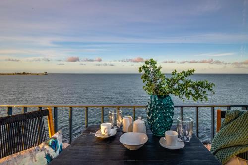 Strandfeder – Moderne Ostsee-Ferienwohnung für Drei im OstseeResort Olpenitz
