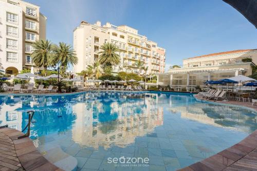 Suíte com vista para praia dentro de hotel - Seazone ILCTOP