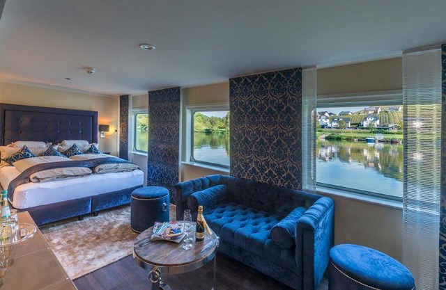 Suite, shower, toilet, river view