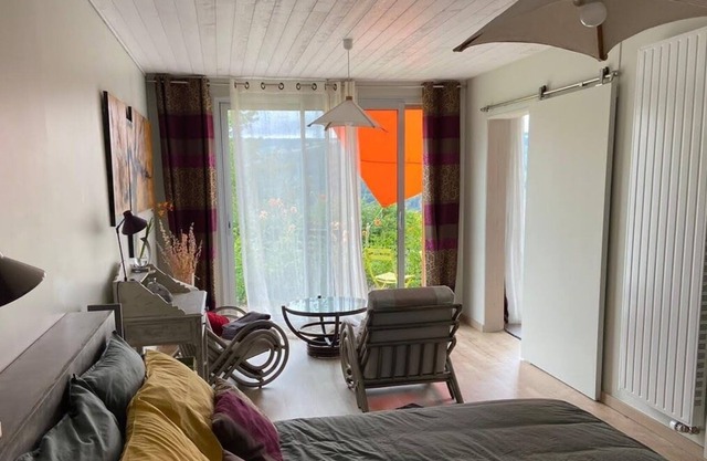 Suite with terrace, overlooking the Monts du Sancy, near La Bourboule.