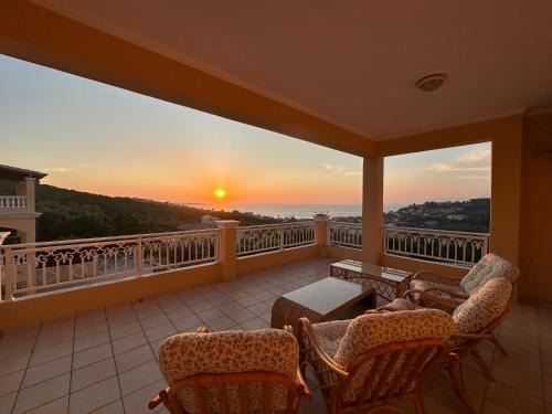Sunsets and large pool in comfy Villa Avra Arillas