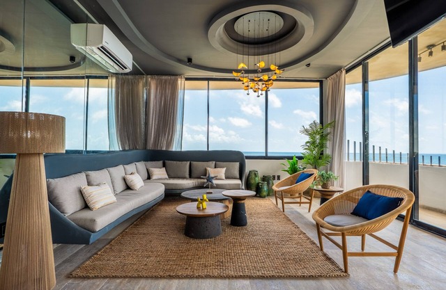 Surreal coastal apartment with local design, shared pool, hot tub, & dogs ok