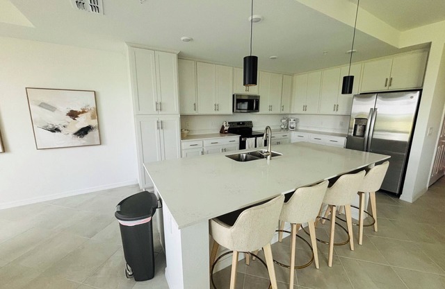 Tee Times and Sunshine- Brand NEW 1st floor condo gated community in WPGCC
