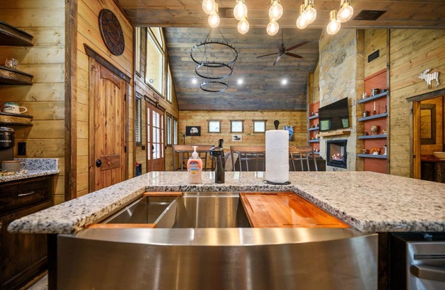 The Adirondack Hottub Shuffleboard Fireplace Foosball Table Arcade