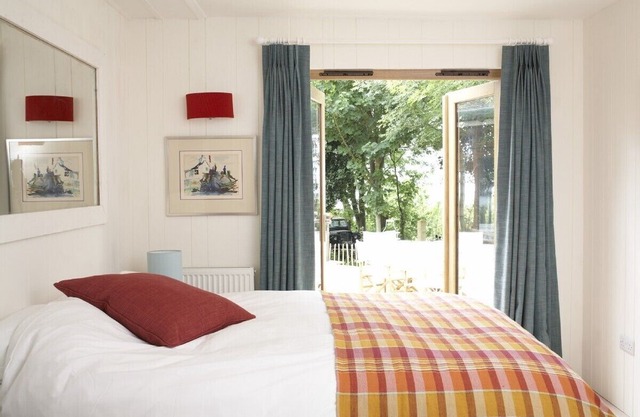 'The Blue House', a stunning cottage with grounds down to the beach.