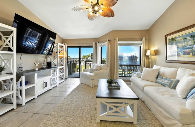 This pool front townhome with beach views is just the ticket for your Island vacation experience.