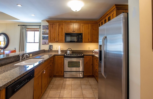 Two Bedroom Condo with Balcony over Mountaineer Square - Just Steps from the Slopes! 2 Condo - No Cleaning Fee! by RedAwning