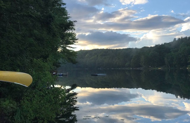 Unwind overlooking the tranquil beauty of Hills Pond