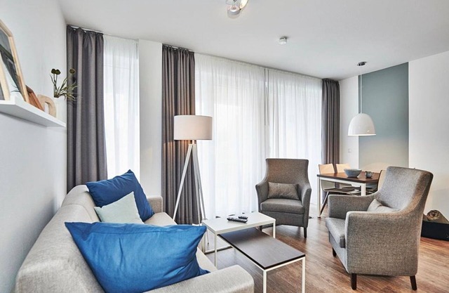 Vacation apartment close to the beach with large terrace incl. use of swimming pool & sauna