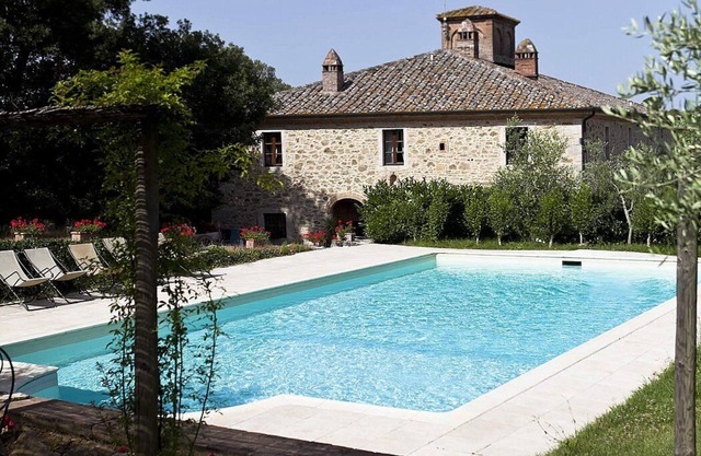 Villa Adalia: An elegant and welcoming apartment that covers the entire top floor of an ancient country manor built on a hillside, surrounded by meadows and woods.