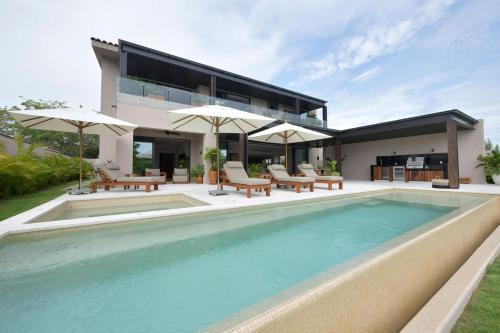 Villa Amada at Porta Fortuna Ocean Views Staff Golf Cart by Mita Residential
