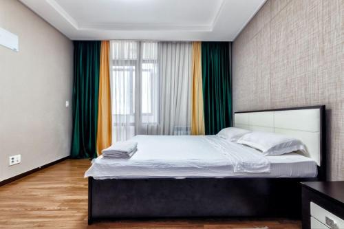 Almaty District Apartment | хайвил 2 комнатная 2006